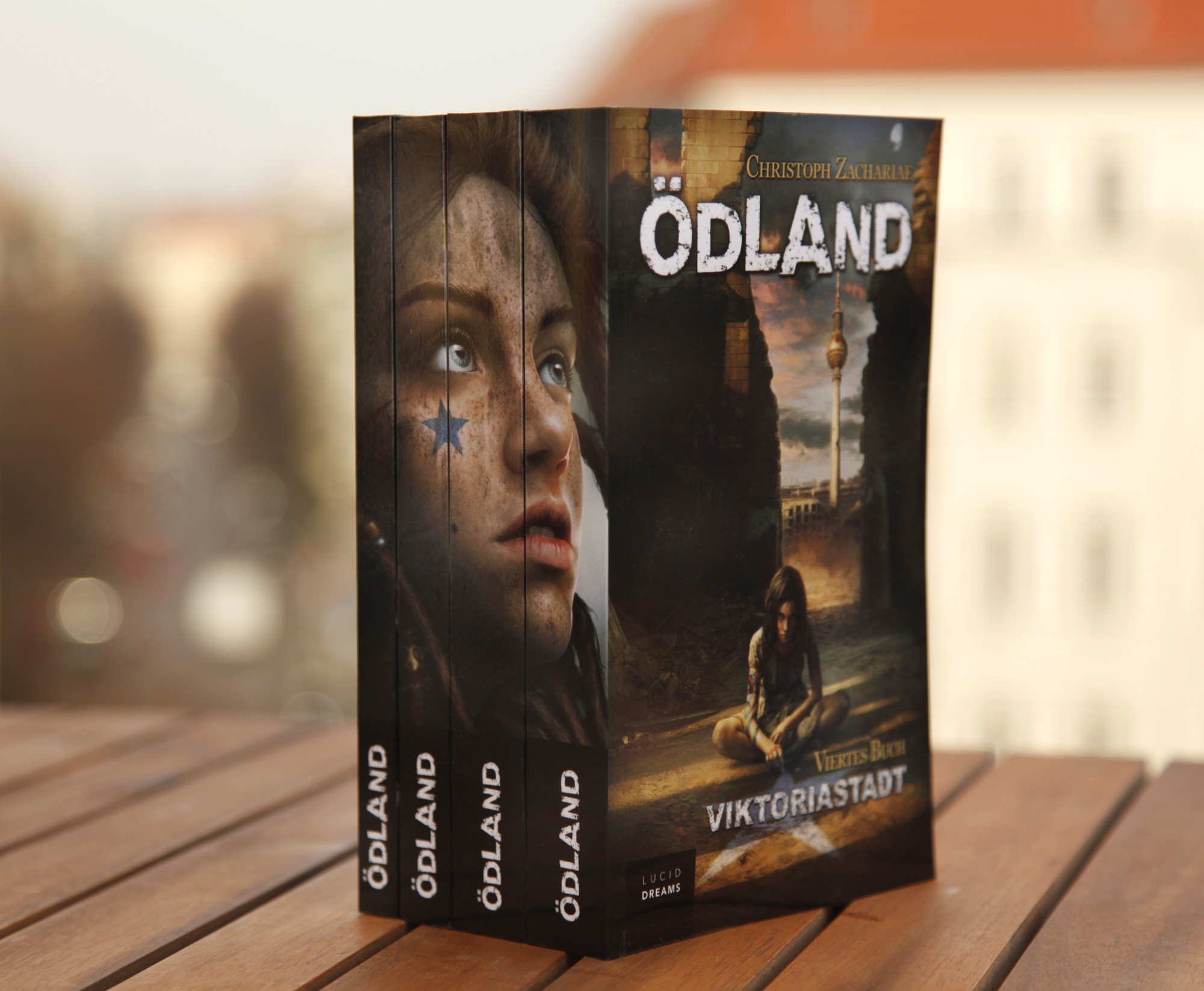 Die ersten vier Bände von Ödland. Copyright: Christoph Zachariae, Lucid Dreams